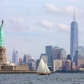 BESHERTE, a Buzzards Bay 18 built by Artisan Boatworks, Rockport, Maine, sails in New York with the backdrop of the Manhattan skyline