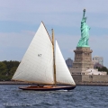 BESHERTE, a Buzzards Bay 18 built by Artisan Boatworks, Rockport, Maine, sails in New York with the backdrop of the Manhattan skyline