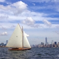 BESHERTE, a Buzzards Bay 18 built by Artisan Boatworks, Rockport, Maine, sails in New York with the backdrop of the Manhattan skyline